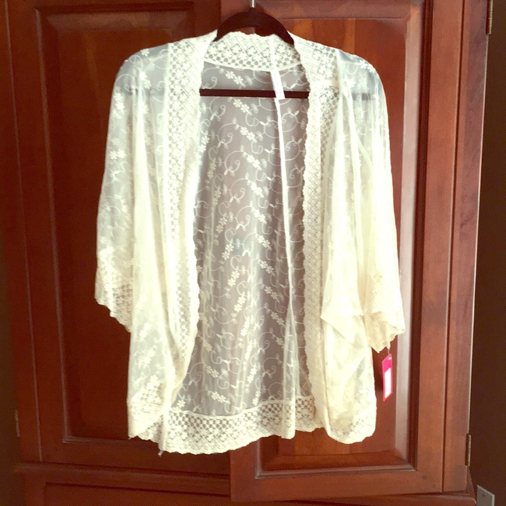 Cream lace kimono.